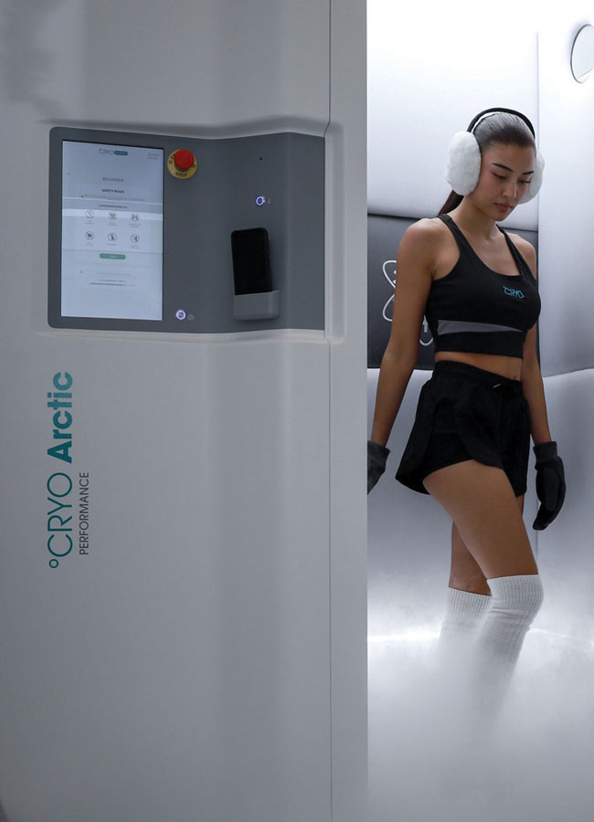 Woman coming out of Cryotherapy Chamber