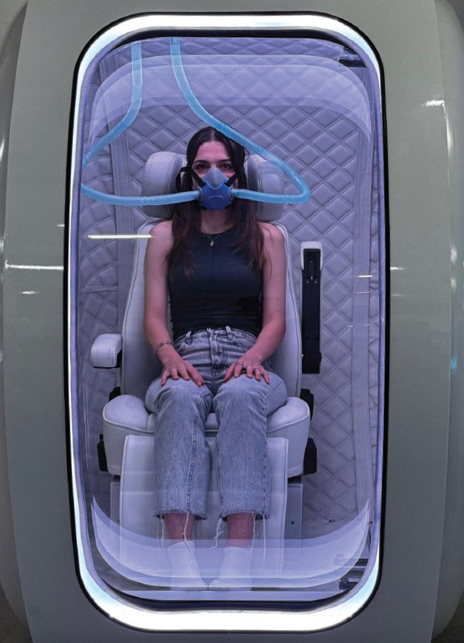 Woman Inside Hyperbaric Chamber